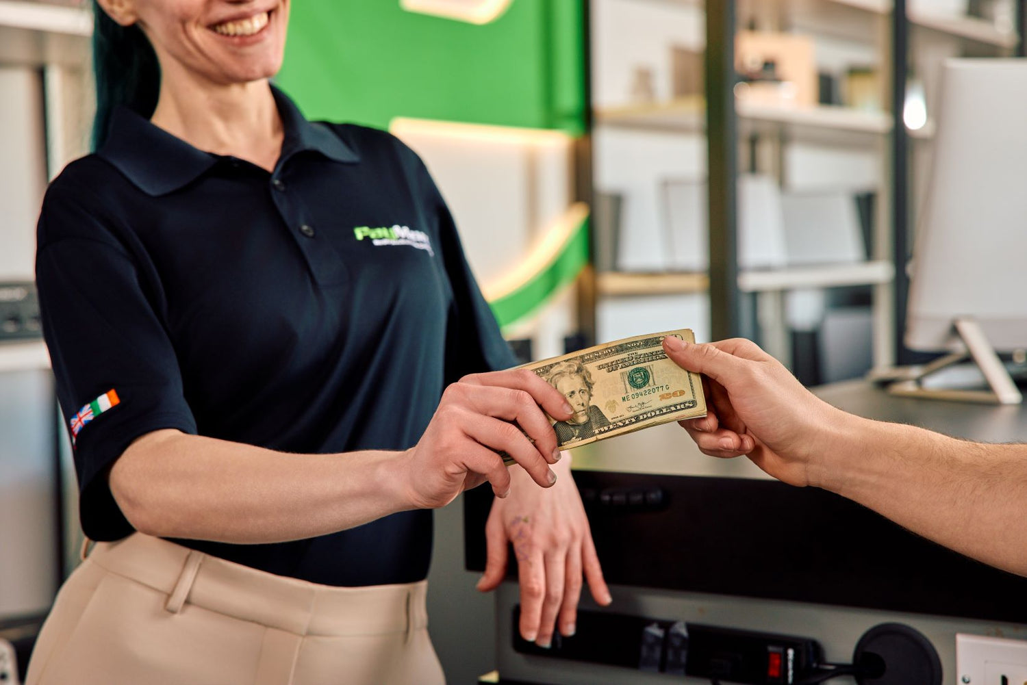 paymore employee paying out a customer